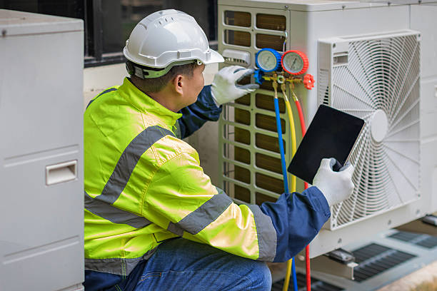 Professional Hvac technician working in Clay, AL